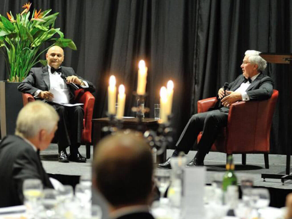 Dr Nik Kotecha OBE and Melvyn King, the former Governor of the Bank of England